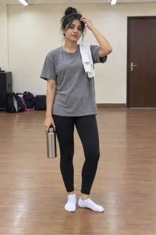 Jagriti, 24, call girl in Borivali, Mumbai: after dance practice in a grey tee and black leggings, a towel on her shoulder